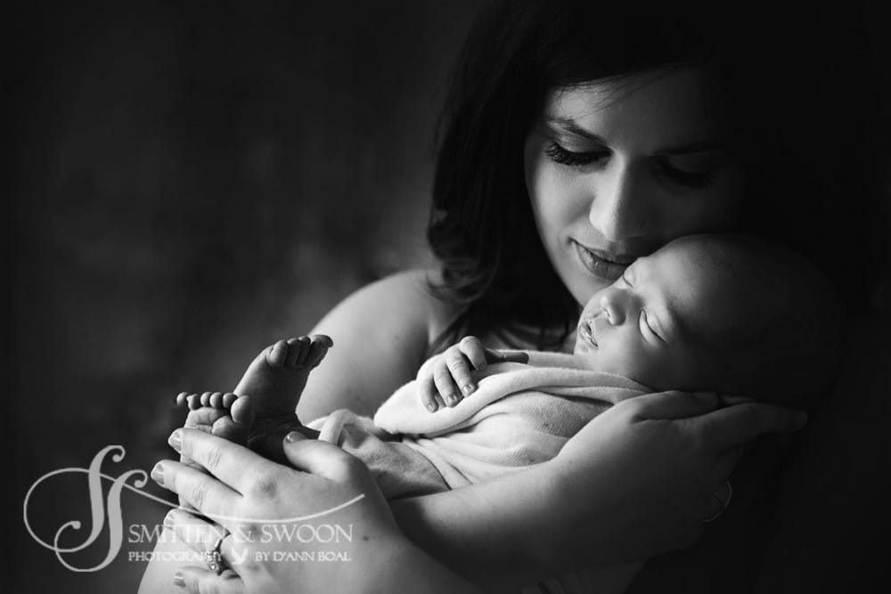 mom holding her newborn baby black and white {boulder newborn photographer}