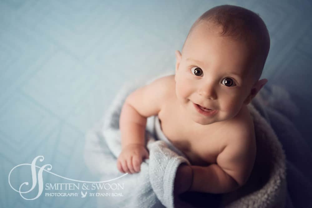 six month baby boy looking up smiling {boulder baby photographer}