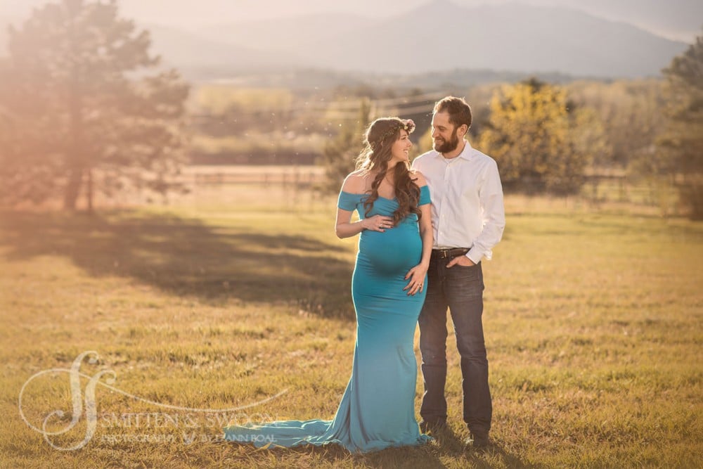 maternity photo with mom and dad smiling {boulder maternity photographer}