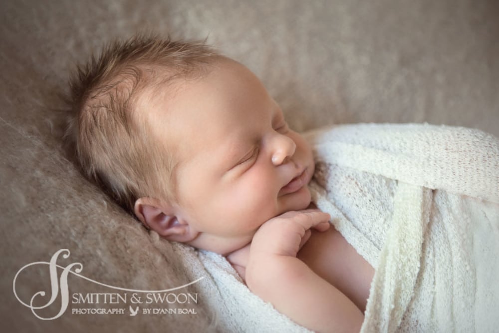 newborn baby smiling {boulder newborn photographer}