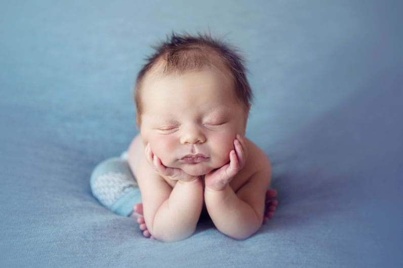 newborn face in hands pose sleeping baby {boulder newborn photographer}