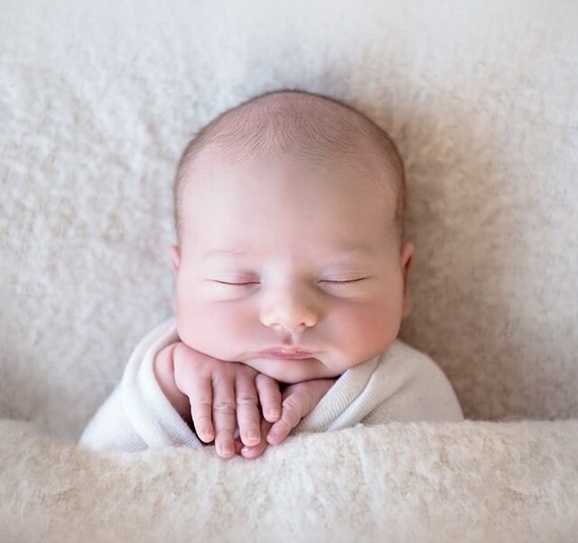 baby boy newborn pose with white blanket - boulder photographer
