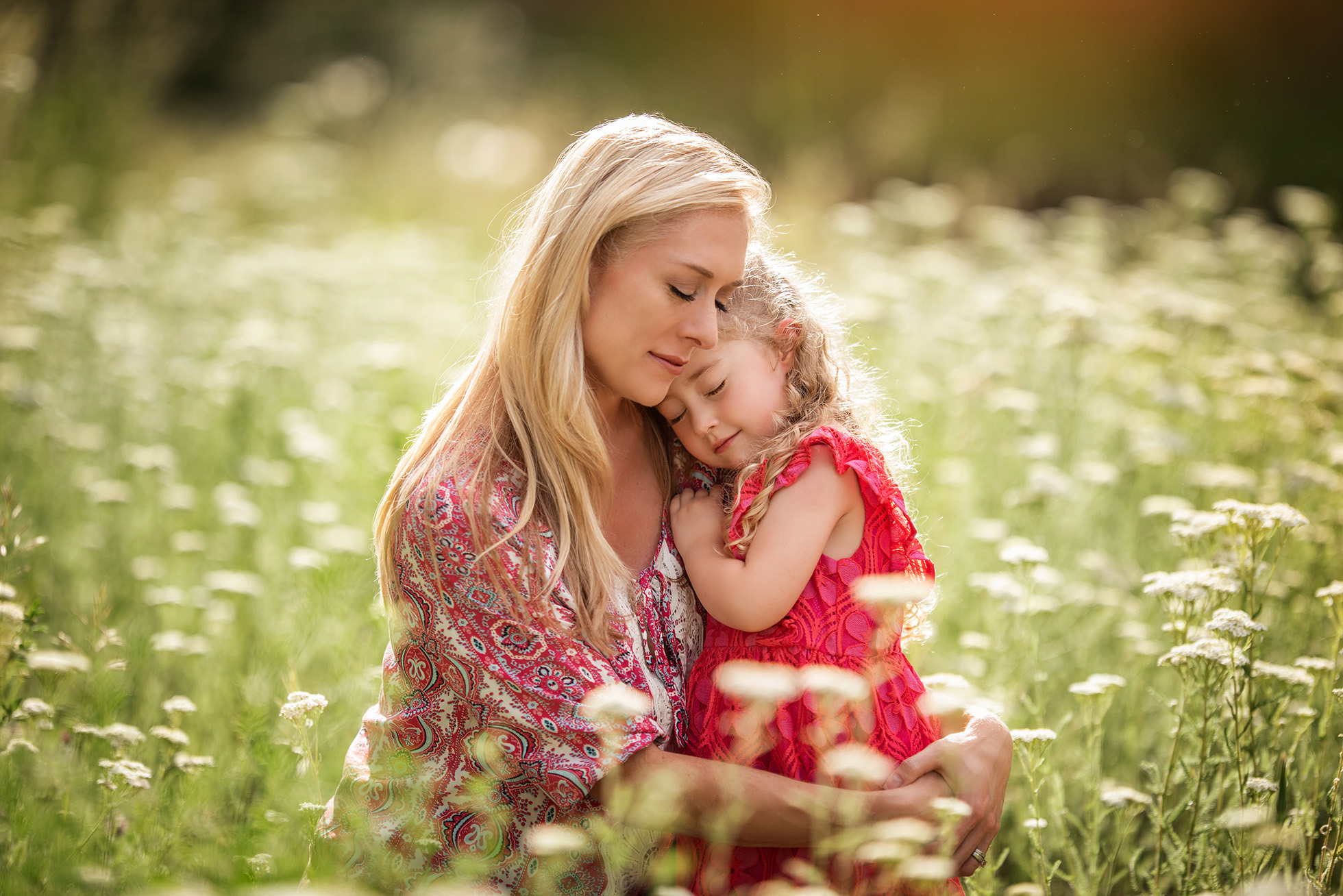 mother and daughter in field of flowers Boulder newborn child & family photographer | the experience