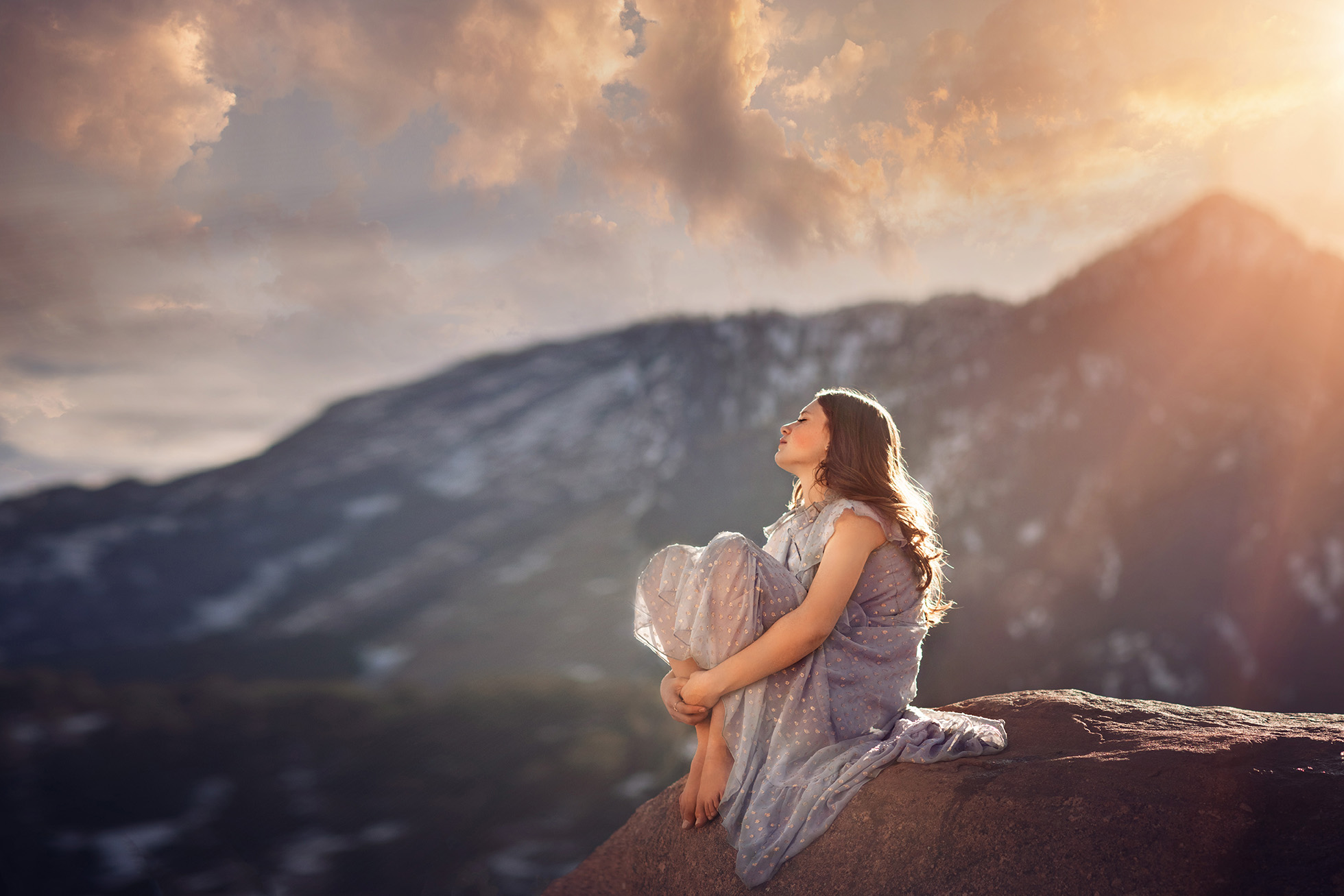 girl looking out on mountain top backlight fine art - boulder's best photographer 